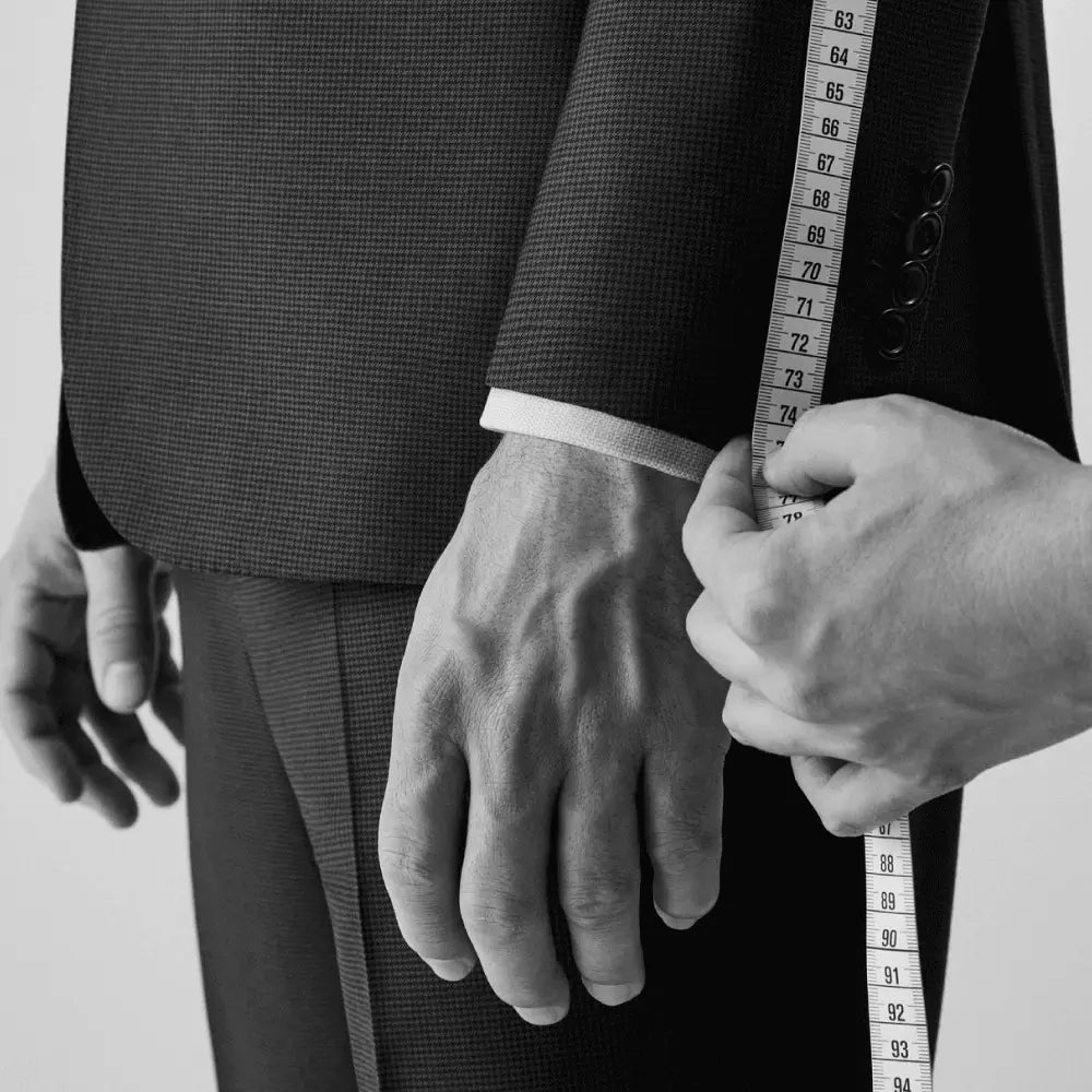 Classic tailoring details – measured shoulders, clean lapels, quiet structure