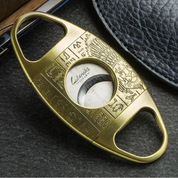 Close-up of Lubinski guillotine cigar cutter showing stainless steel blades