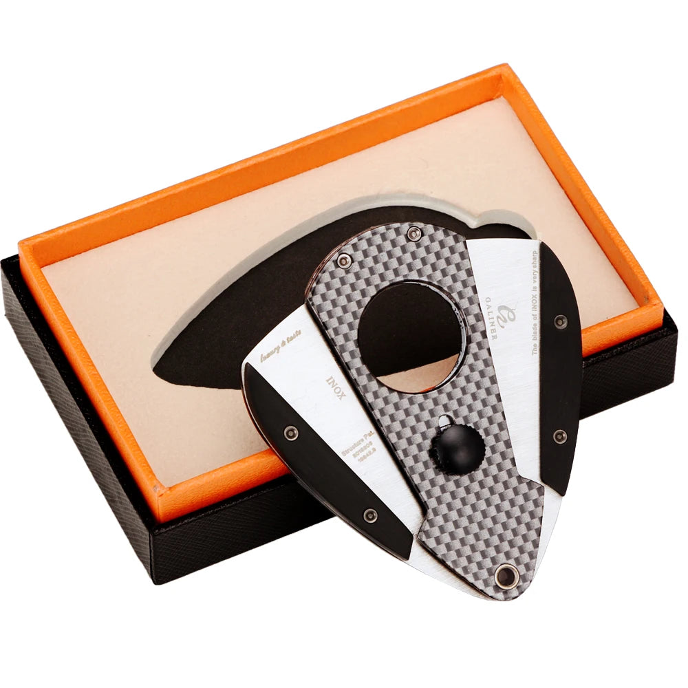 Side view of GALINER luxury guillotine cutter trimming a cigar
