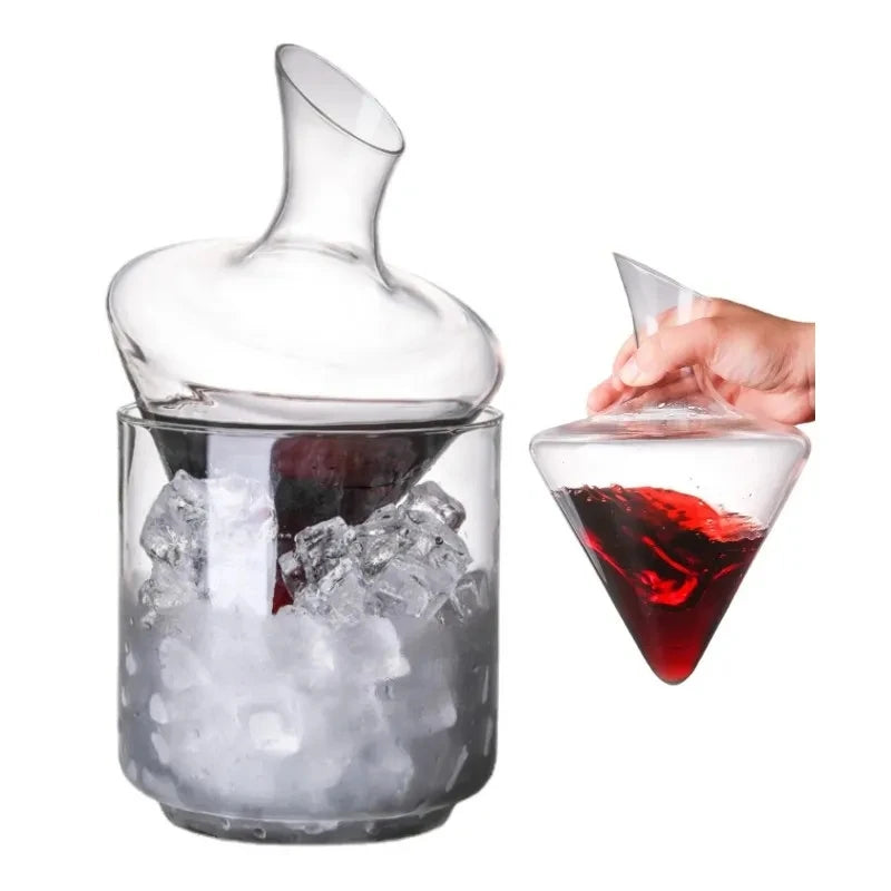 Red wine being poured from bottle into cone-shaped decanter set inside clear ice bucket