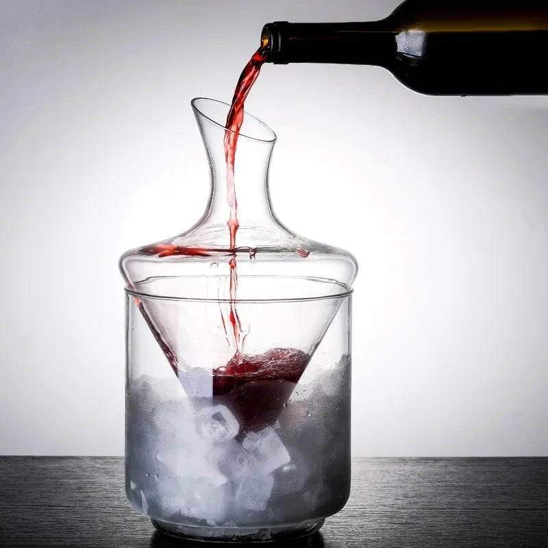 Lead-free glass wine decanter with inner cone resting in ice-filled bucket on dark bar surface
