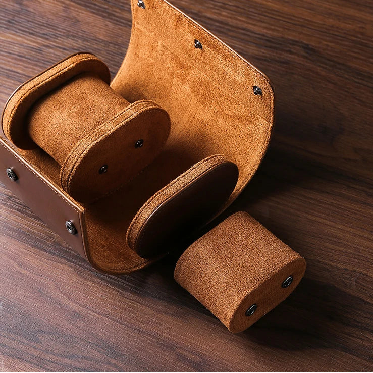 Three-slot watch roll interior with suede lining and pillows