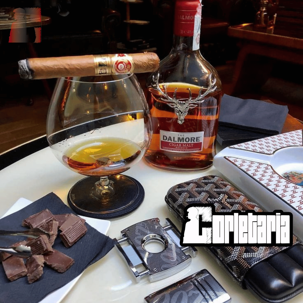 Whiskey glass, cigar, and luxury accessories on table — Corletaria lifestyle.